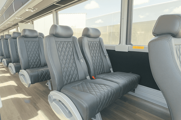 interior of Orange Minibus Company charter bus