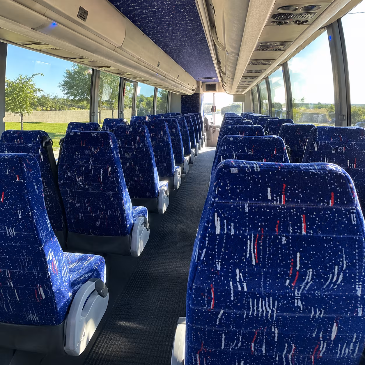 how one way transfers round trips and multi day bookings are priced for bus rentals in orange