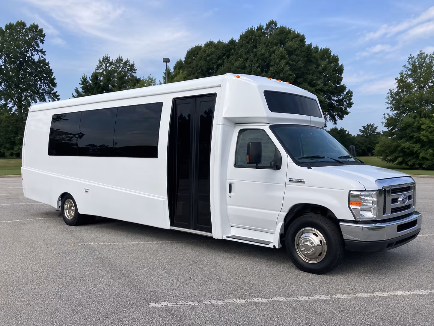orange 18 passenger party bus