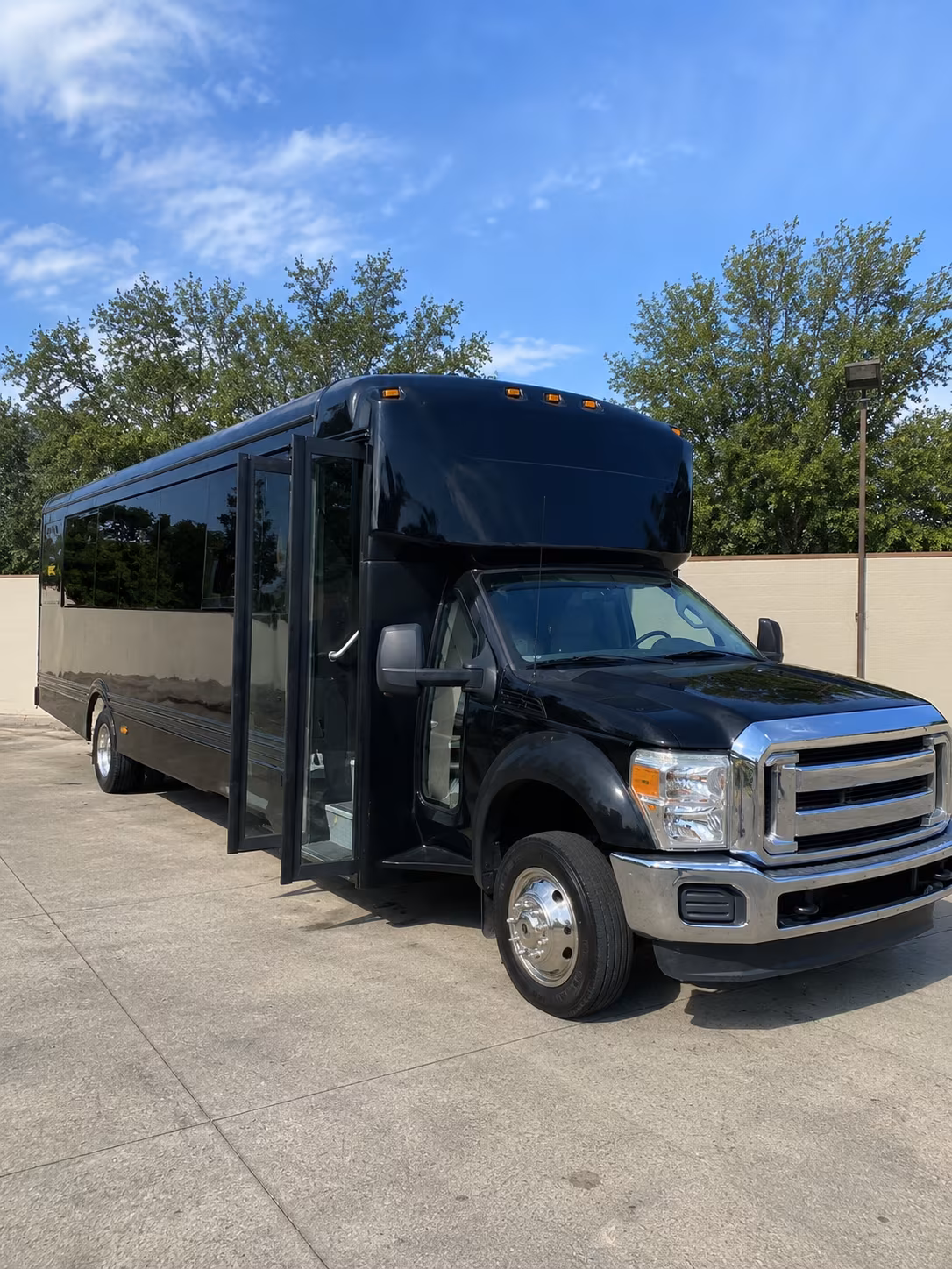 orange 20 passenger party bus
