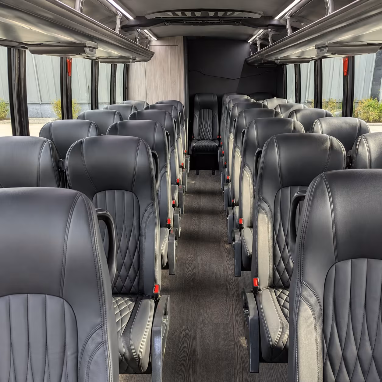 orange 25 passenger minibus inside