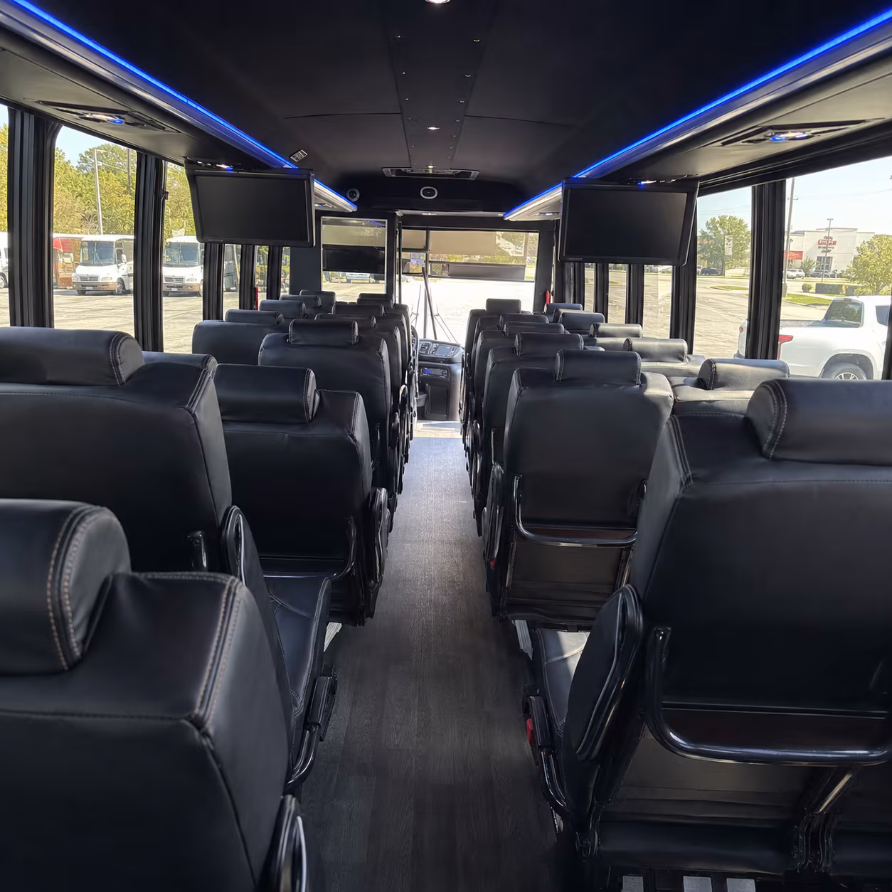 orange 28 passenger minibus inside