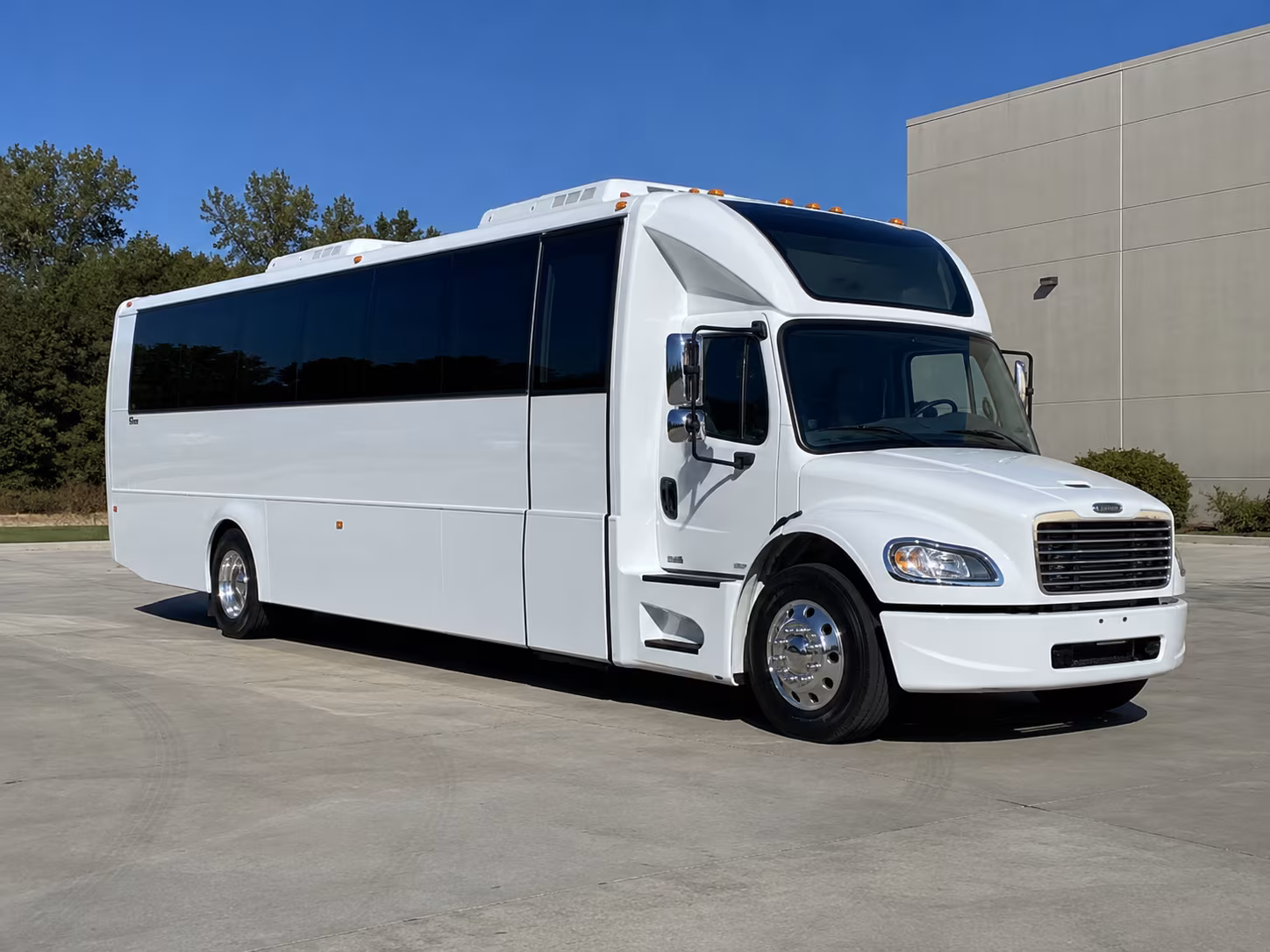 orange 28 passenger party bus