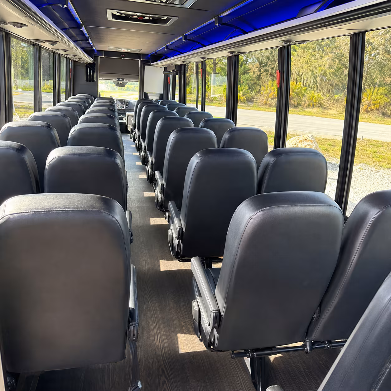 orange 30 passenger minibus inside
