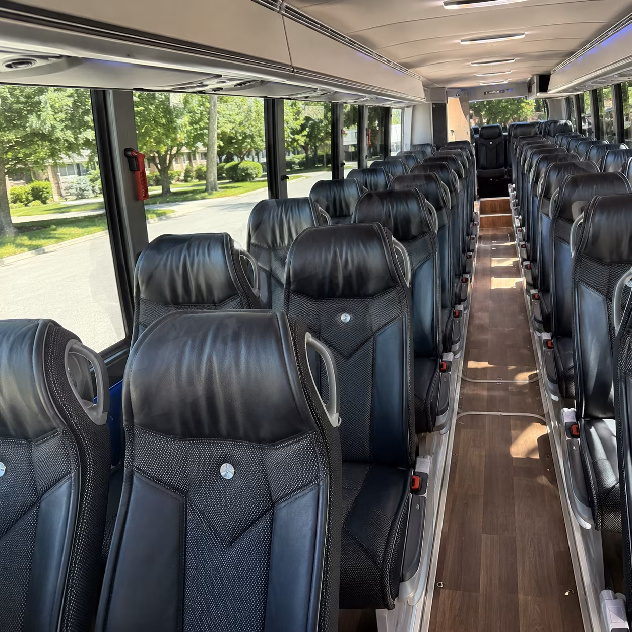 orange 40 passenger charter bus inside