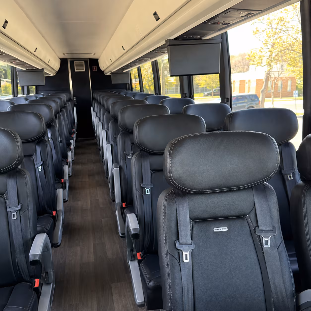 orange 45 passenger charter bus inside