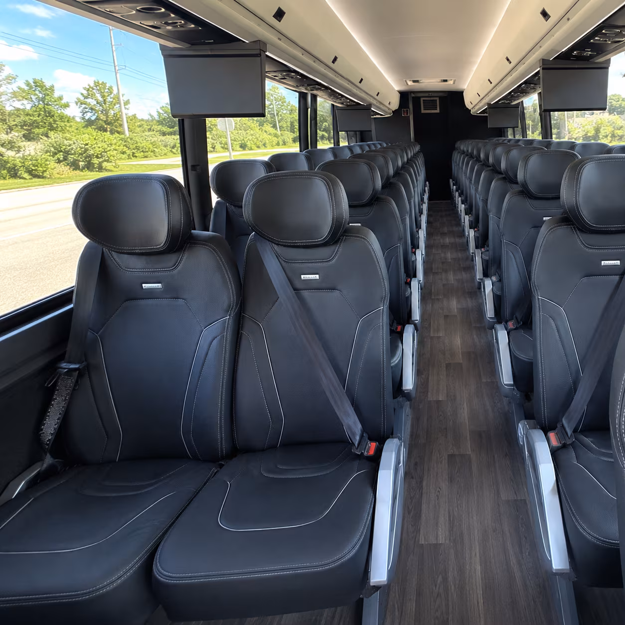 orange 47 passenger charter bus inside