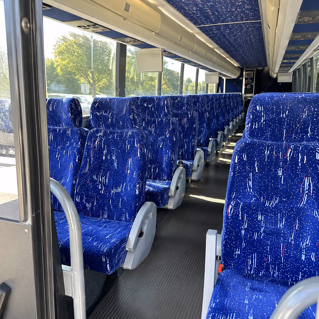 orange 50 passenger charter bus inside