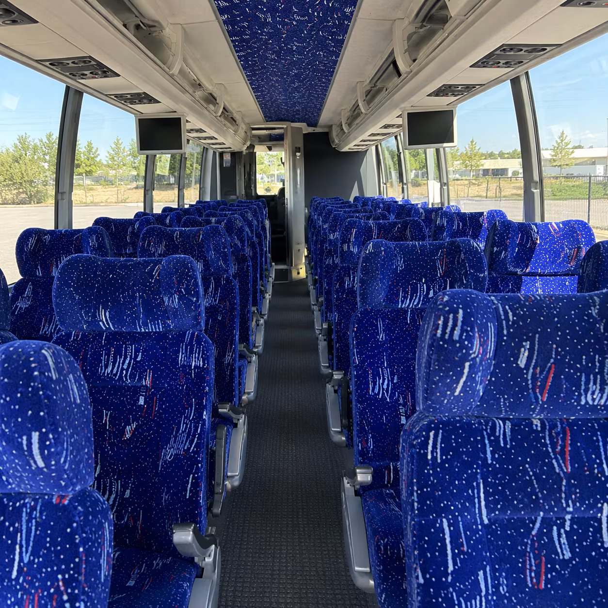 orange 54 passenger charter bus interior