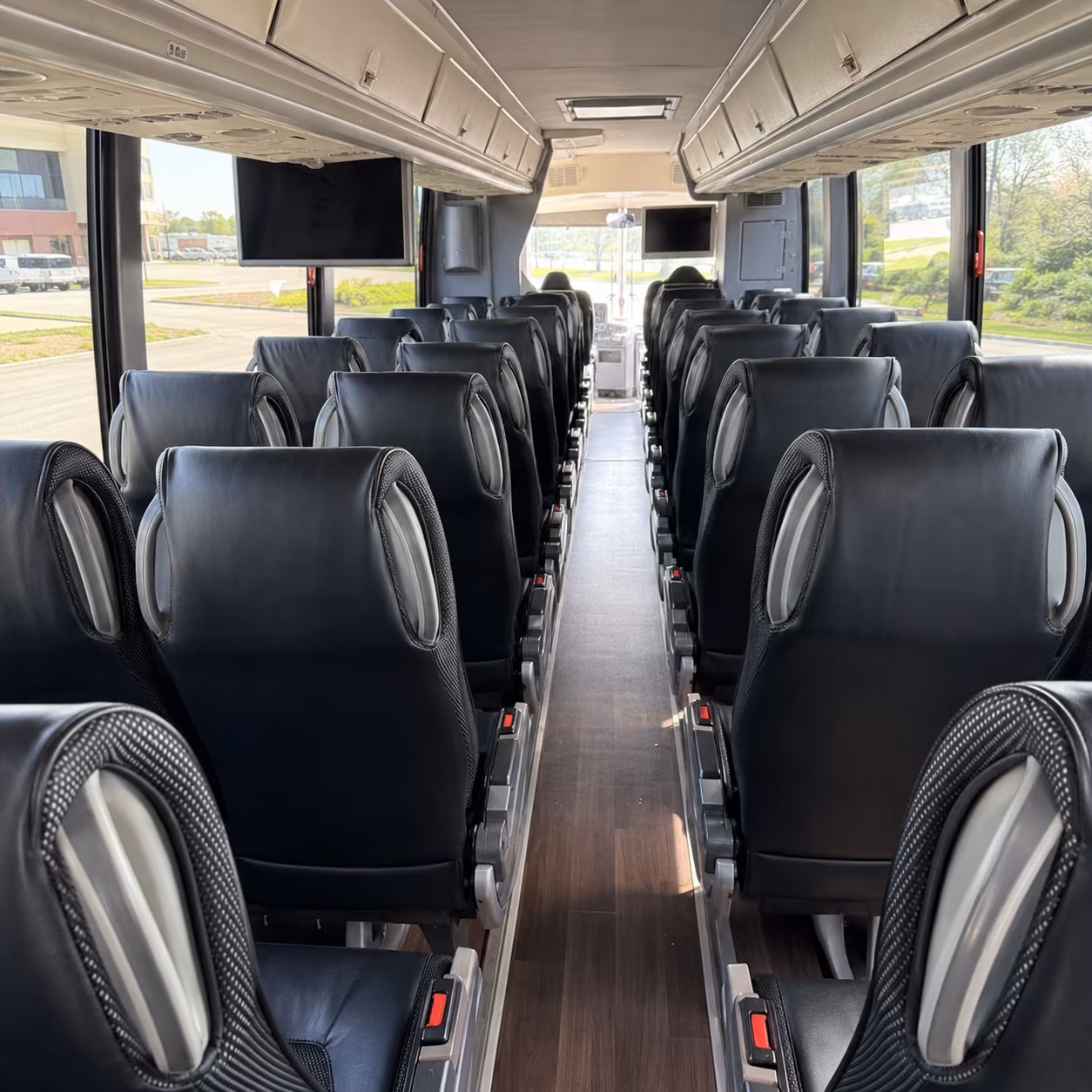 orange 56 passenger charter bus inside